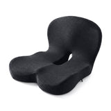 Coussin d'assise ergonomique en mousse à mémoire de forme posé sur une chaise