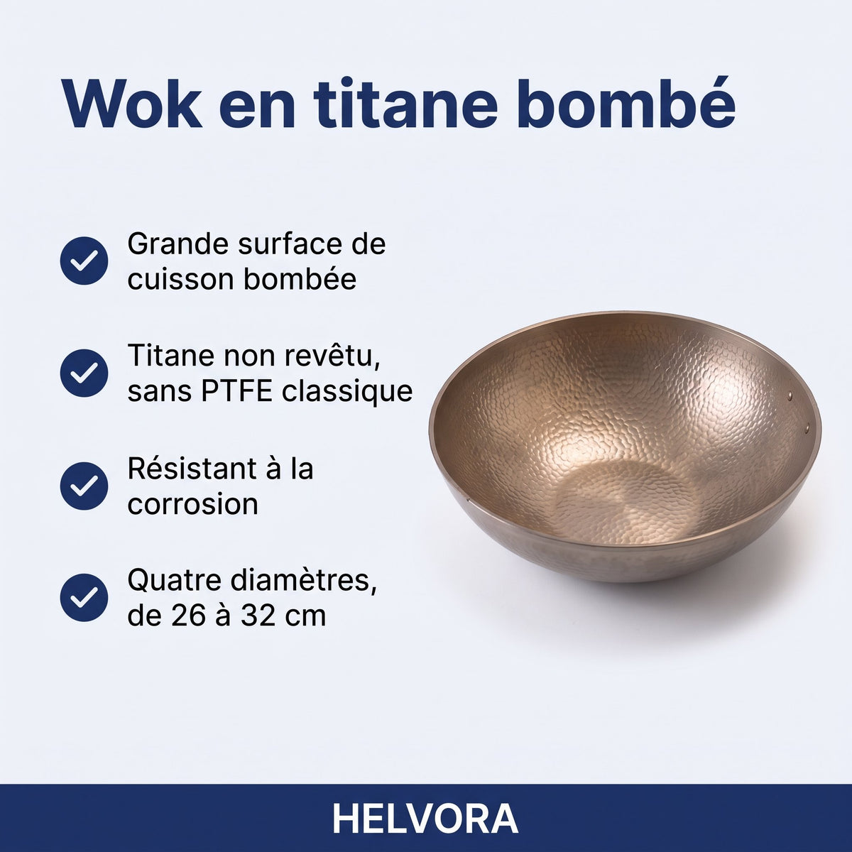 Wok en titane bombé sans revêtement posé sur une plaque de cuisson