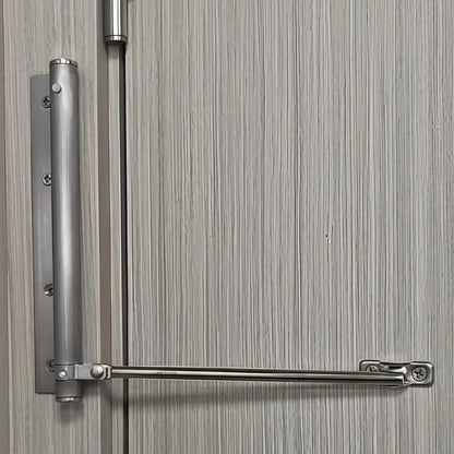 Ferme-porte automatique en acier inoxydable fixé sur une porte