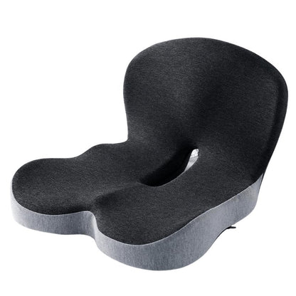 Coussin d'assise ergonomique en mousse à mémoire de forme posé sur une chaise